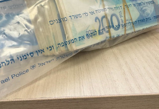 תיעוד הכספים שנתפסו (צילום: דוברות המשטרה)