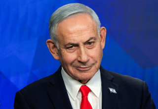 בנימין נתניהו (צילום: RONEN ZVULUN / POOL / AFP via Getty Images)