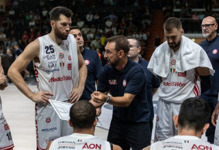 שחקני מילאנו ופפה פואטה (צילום: Getty images)