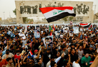 הפגנת תמיכה בחוק בעיראק  (צילום: REUTERS/Thaier al-Sudani)