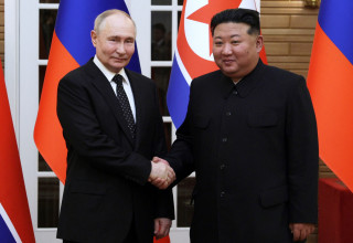 ולדימיר פוטין, קים ג'ונג און (צילום: Sputnik/Gavriil Grigorov/Pool via REUTERS)