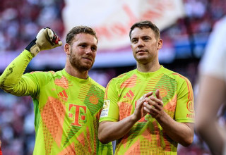 מנואל נוייר, דניאל פרץ (צילום: Sebastian Widmann/Bundesliga / Contributor)