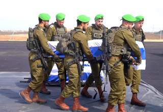 קבלת ארונות של חטופים חללים, 20 בפברואר 2025 (צילום: דובר צה"ל בערבית)