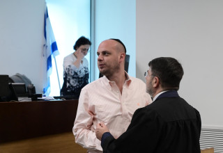 אלי פלדשטיין בבית המשפט (צילום: אבשלום ששוני)