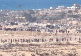 תור לחלוקת סיוע הומניטרי (צילום: שימוש לפי סעיף 27א')