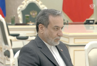 שר החוץ האיראני מתארח בקרמלין אצל פוטין (צילום: Kremlin.ru/Handout via REUTERS)