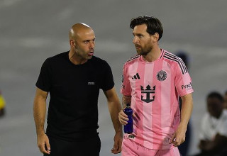 חאבייר מסצ'ראנו וליאו מסי (צילום: Kevin C. Cox)