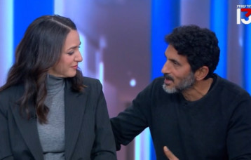 צחי הלוי מפתיע את לוסי אהריש בשידור חי (צילום: צילום מסך רשת 13)