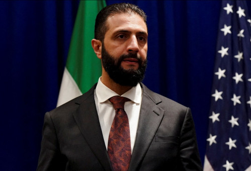 אחמד א-שרע (אל-ג'ולאני) (צילום: REUTERS/Bing Guan/Pool)