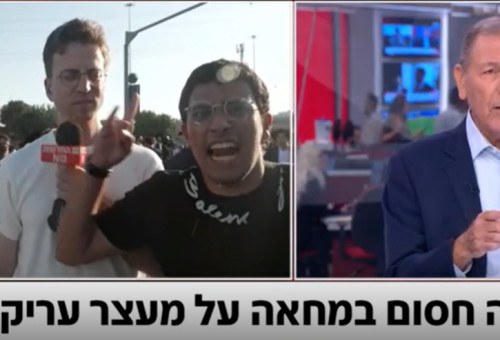 כתב חדשות 12, אלי הירשמן, הותקף במהלך הפגנת חרדים (צילום: צילום מסך, קשת 12)