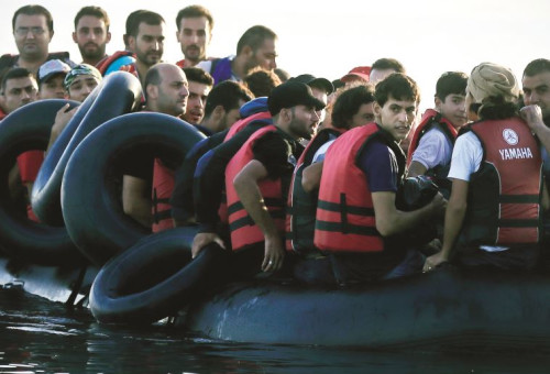 סירת גומי עם מבקשי מקלט, האי קוס, מאיר בלייך (צילום: רויטרס)