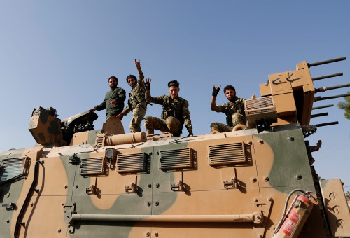 לוחמים כורדים בצפון סוריה (צילום: רויטרס)