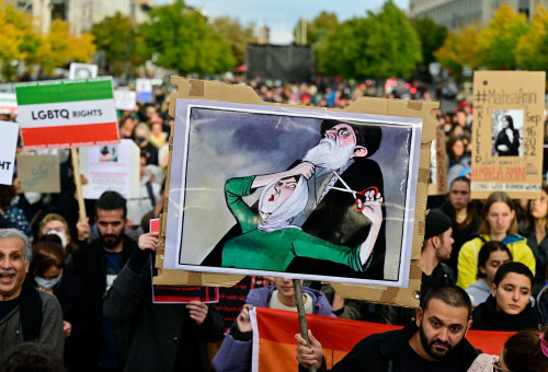 המחאה נגד המשטר באיראן (צילום: John MACDOUGALL / AFP)