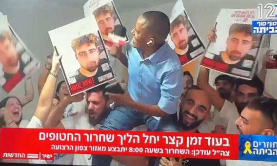 ברהנו טגניה על הכתפיים (צילום: צילום מסך חדשות 12)