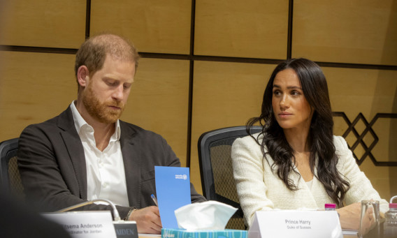 הנסיך הארי ומייגן מרקל (צילום:  World Helath Organisation via Getty Images)