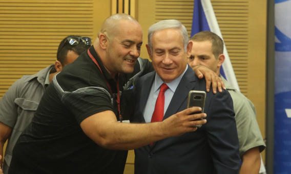 בנימין נתניהו ואיציק זרקא (צילום: מרק ישראל סלם)