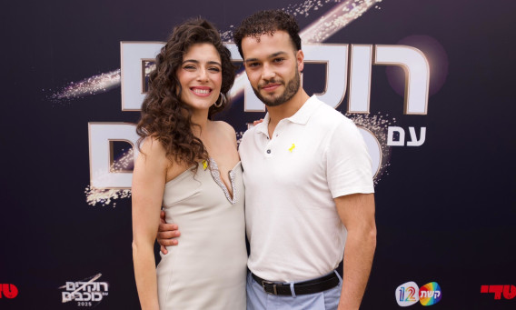 רוני דלומי והרקדן לוטם מדמוני (צילום: נדב צור)