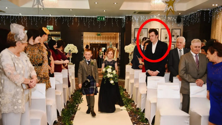 האדם האלמוני בחתונה של מישל וג׳ון