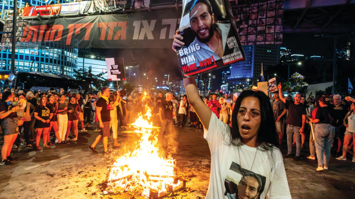 עינב צנגאוקר בהפגנה (צילום: אדר אייל)