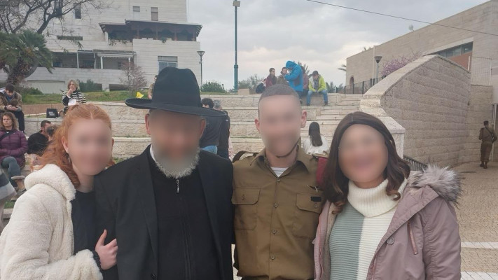 סרן מ' עם המשפחה