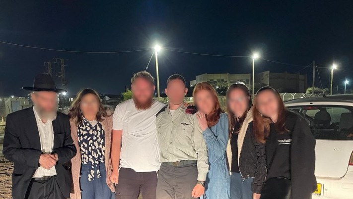 סרן מ' עם המשפחה