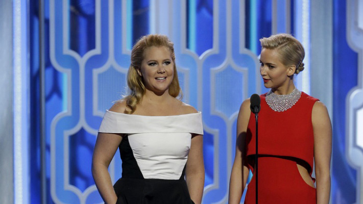 איימי שומר וג'ניפר לורנס, גלובוס הזהב (צילום: רויטרס)