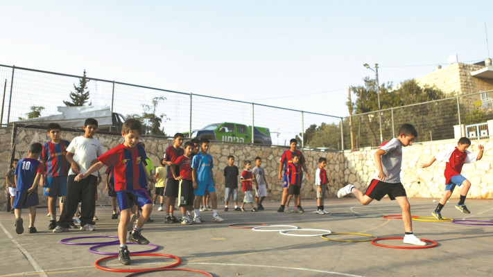 שיעור ספורט (צילום: מתניה טאוסיג, פלאש 90)