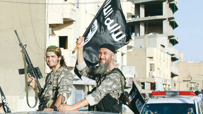 פעילי דאעש בסוריה (צילום: רויטרס)