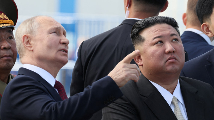 ולדימיר פוטין, קים ג'ונג-און (צילום: Sputnik/Mikhail Metzel/Kremlin via REUTERS)
