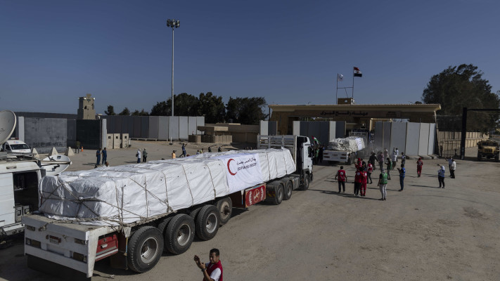 סיוע הומניטרי במעבר רפיח (צילום:  MAHMUD KHALED/AFP via Getty Images)
