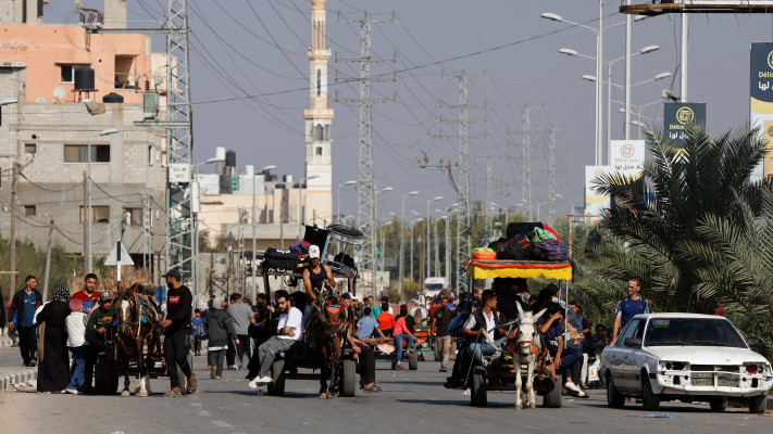 תושבי עזה בצפון הרצועה (צילום: REUTERS/Mohammed Salem)