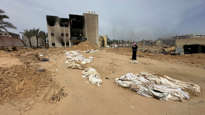 הרוגים בעזה, בבית החולים נאצר (צילום: REUTERS/Doaa Rouqa)