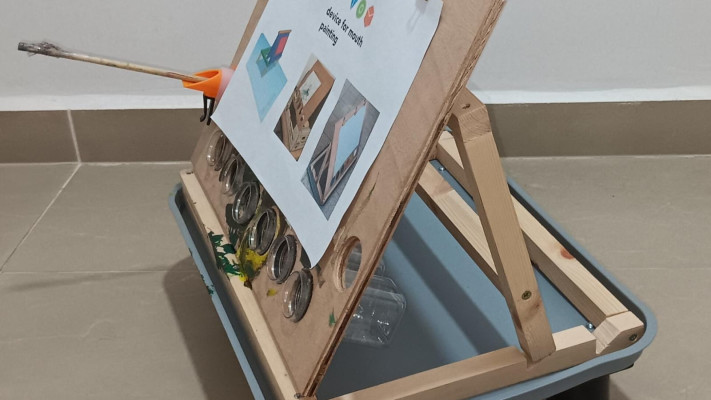 לאפשר עצמאות לאנשים עם מוגבלויות המציירים בעזרת הפה