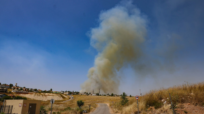 שריפות בעקבות ירי רקטי (צילום: דוד כהן, פלאש 90)