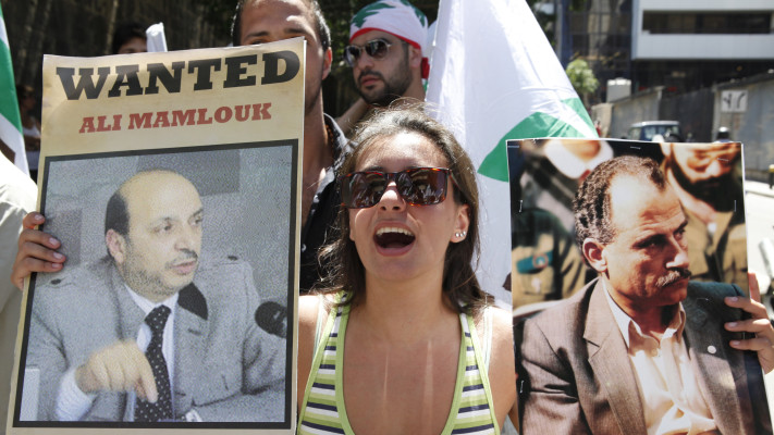 מחאה נגד עלי ממלוכ (צילום:  REUTERS/Mohamed Azakir)