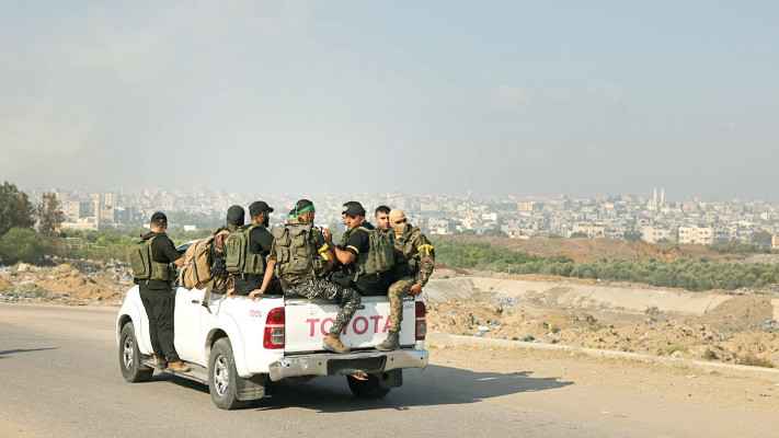 פלסטינים עזה פריצה טנדר פורצים גדר גבול 7 אוקטובר חמאס חרבות ברזל