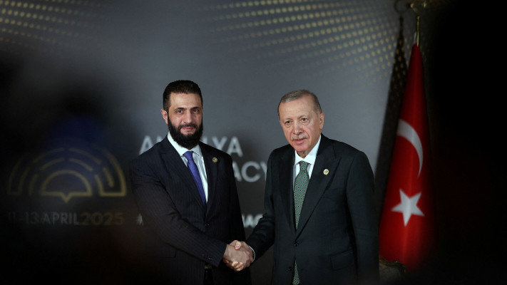 רג'פ טאיפ ארדואן, אחמד א-שרע (צילום: Murat Cetinmuhurdar/PPO/Handout via REUTERS)