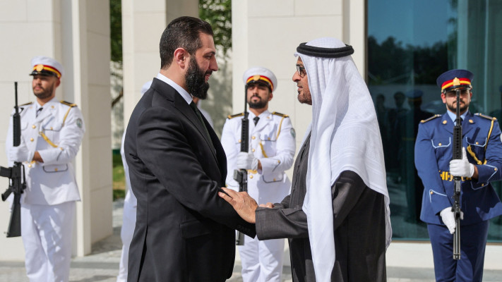 עבדאללה בן זאיד אאל נהיאן, אחמד אל שרע (צילום: Syrian Presidency/Handout via REUTERS)