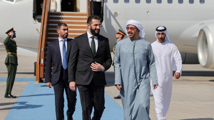 אחמד א-שרע, עבדאללה בן זאיד (צילום: Syrian Presidency/Handout via REUTERS)