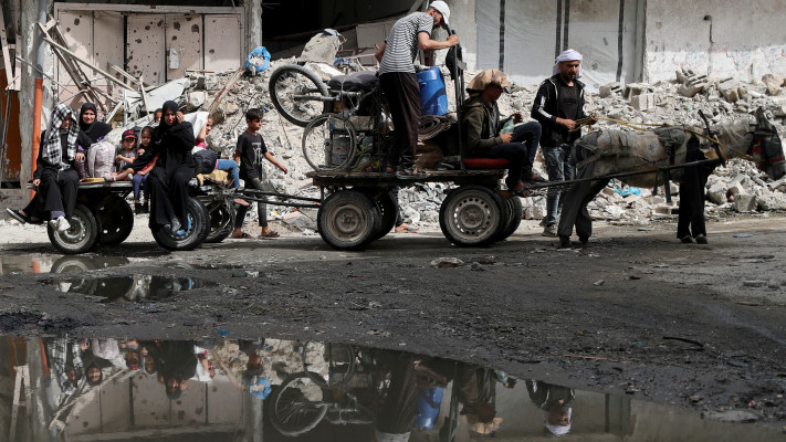 תושבי רצועת עזה (צילום: REUTERS/Mahmoud Issa)