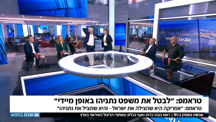 עו''ד ציון אמיר יוצא בזעם מהאולפן  (צילום: צילום מסך קשת 12)