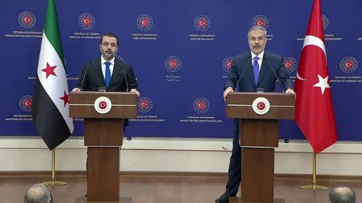 שר החוץ הטורקי הקאן פידאן ומקבילו הסורי אסעד חסן א-שיבאני 