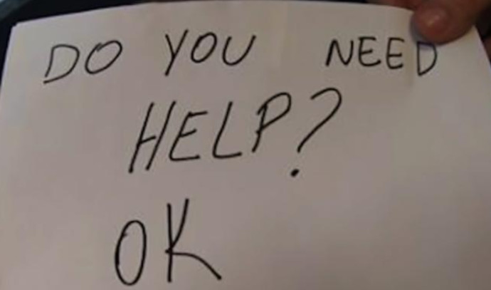 A waitress wrote on a note “Need help?”  And saved the life of a little boy