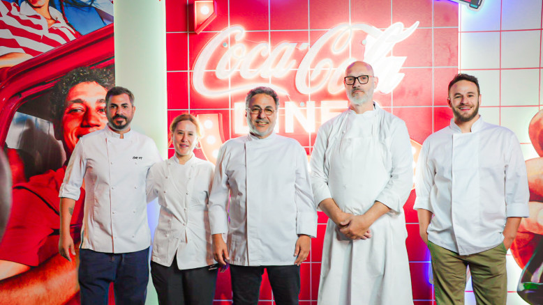 Burger on a red bun and hot dog pretzel: Coca‑Cola’s diner opens