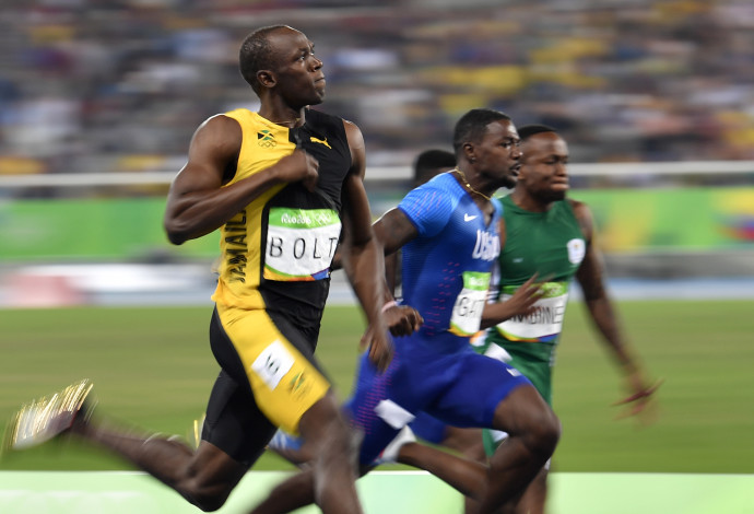 יוסיין בולט זוכה בריצה ל-100 מטרים בריו 2016 (צילום:  AFP)