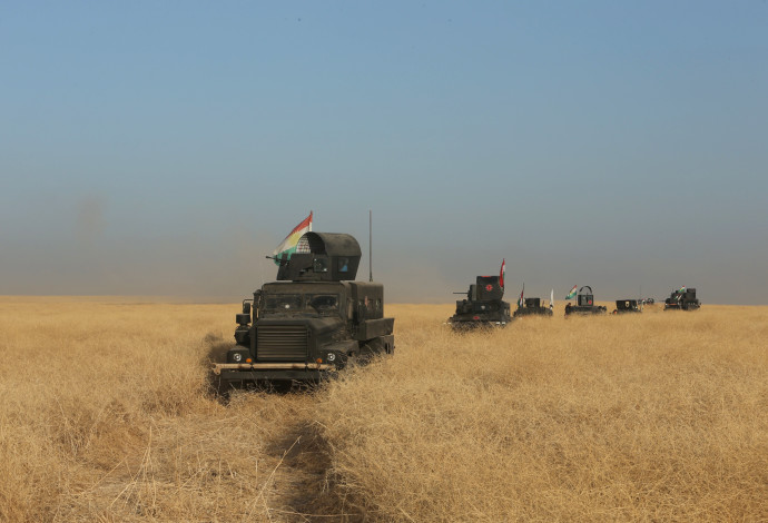 כוחות הפשמרגה הכורדים בדרך למוסול (צילום:  רויטרס)