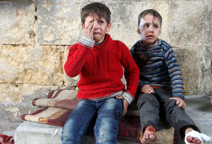 ילדים פצועים בחלב (צילום:  רויטרס)