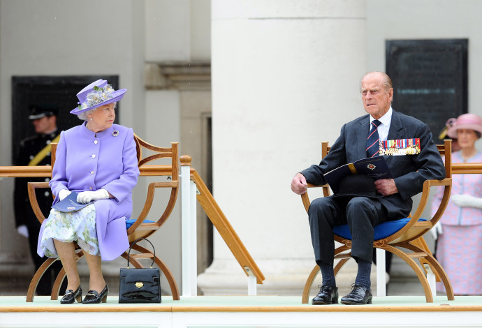 המלכה אליזבת והנסיך פיליפ (צילום:  AFP)
