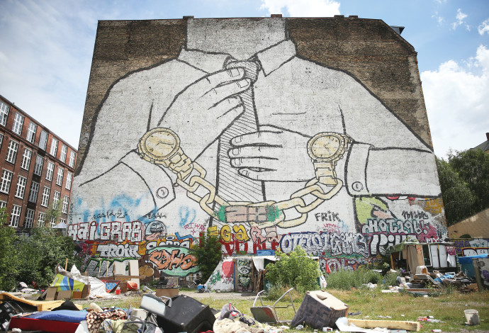 אמנות רחוב בברלין (צילום:  Sean Gallup/Getty Images)