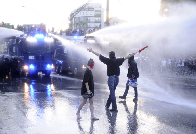 הפגנות נגד טראמפ לקראת ועידת ה-G20, המבורג (צילום:  AFP)